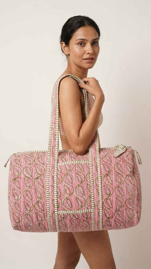 DUFFLE BAG  - Soft light pink color with a unique floral.